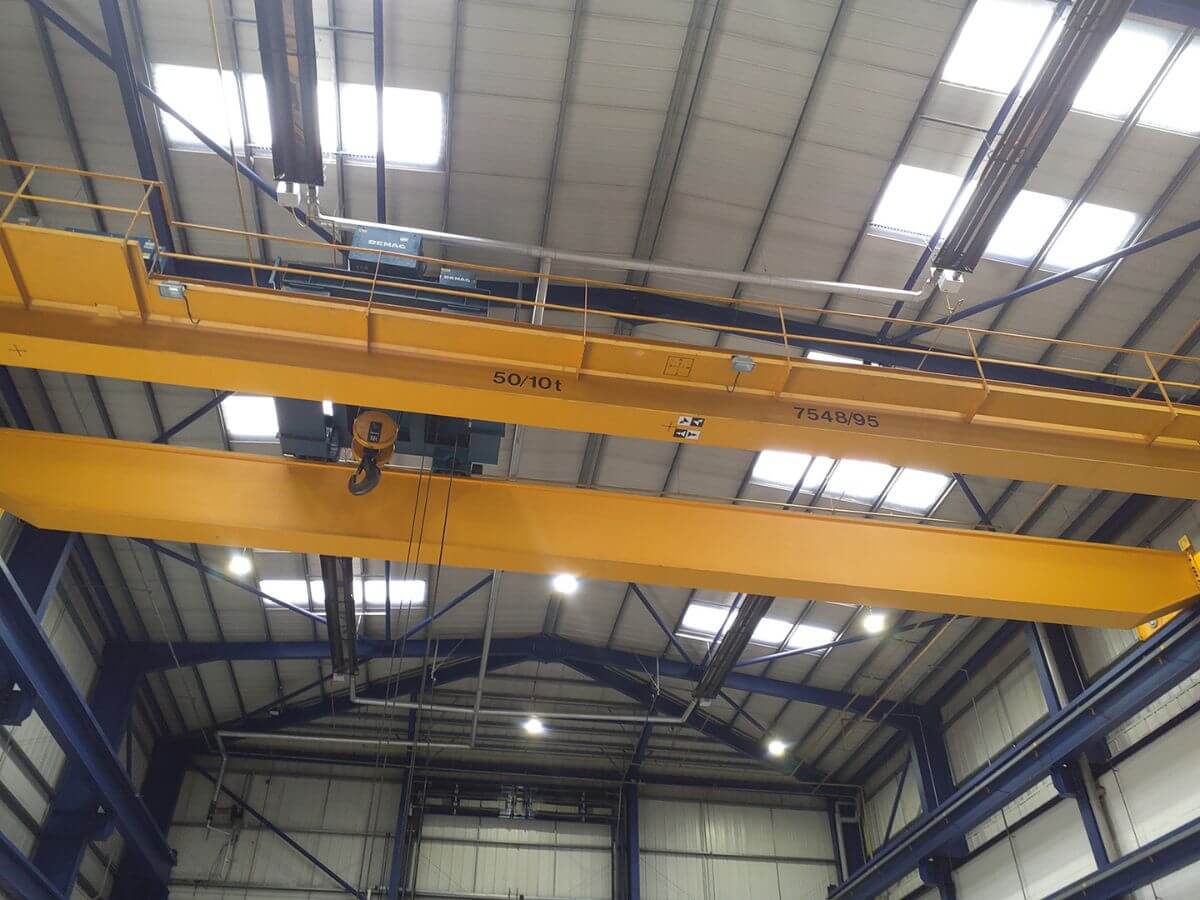 A Red Rooster Lifting overhead crane in a warehouse _ How often should an overhead crane be serviced (1)