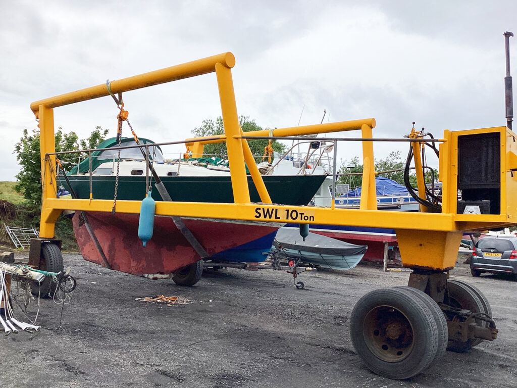 Full view of 40-tonne and 10-tonne boat hoists in action on marine slipway
