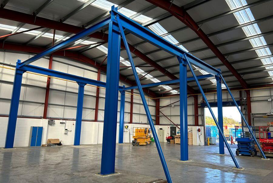 A Crane Structure by Red Rooster Lifting in a warehouse space